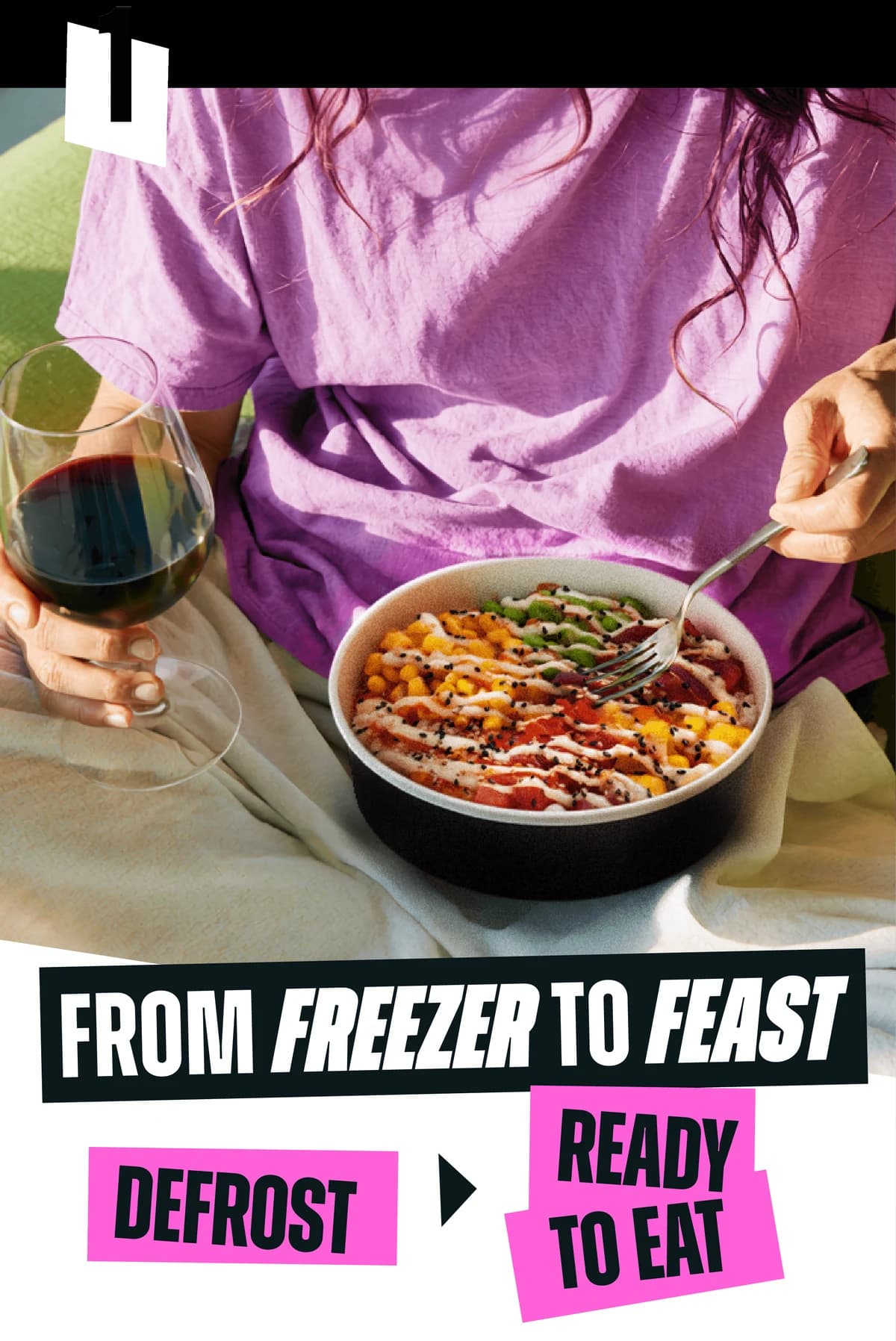1. From freezer to feast: defrost, ready to eat. A woman eating a poké bowl with a glass of wine.